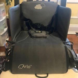 Travel booster seat with storage
